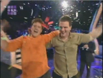 Bernie and his brother celebrating the million dollar win on Who Wants to Be a Millionaire?!