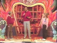 Ralph explaining what to do at the Heroes and Villans area