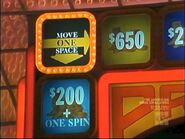 Move One Space from Round 1 of a series episode. Would you like to have $650 or $200 + One Spin? (This isn't too hard a dilemma, is it?)