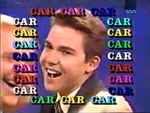 Johnny won $2,200 and a car! This was the second version of the rainbow "CAR" word chase graphic used during the Bill Rafferty era.