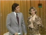 Chuck and Susan from 1976. Early in the series run, the yellow curtain was adorned with lights.