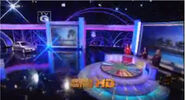 The set from Season 28 with the updated "generic" backdrop.