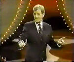 It's Orson Bean! He was seen on several game shows before and after this pilot, but this may have been his first time hosting.