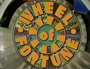 Starting in August 1983, the logo was placed over a top-down view on the Wheel. That's much better!