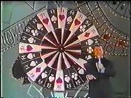 A year before Chuck, DC had its own "Wheel of Fortune". Early in the run, the wheel consisted of card symbols and was called "The Mint Wheel."