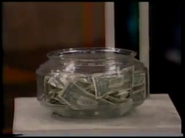 ...or a fishbowl of cash, representing a random number.