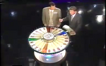 Early Early Day Bonus Wheel. Notice the show's logo (colors in its "wedges") in the center.