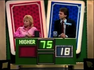Same podium but with the process being the other way around. This will signify that if the player who guessed 2nd is correct, the word "higher" (seen here) or "lower" would flash, and the 1st player's guess would vanish. Notice the same answer from the previous picture. The champion here is Faith, who won the most Money Cards cash in the history of any incarnation: $29,000!