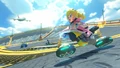 Peach, tearing up the race track in Mario Kart 8.