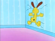 Run into the Wall Contest: Odie slams himself into the wall after being tricked by Garfield.