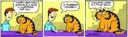 Garfield's first interaction with a toy mouse