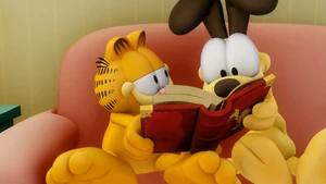 Garfield and Odie read a story together.