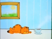 So Close, but So Far: Garfield falls asleep before he is able to reach his coffee.
