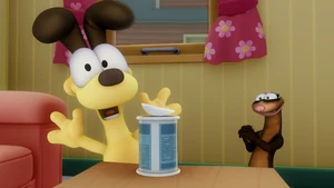 Odie easily opens a can that Garfield spent all day trying to open.