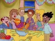 Life of the Party: People gather around and watch Garfield as he dances in the dip.