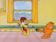 Vet: Garfield clucks after telling Odie a fib about an uncle who got his brain replaced with a chicken brain during a trip to the vet.