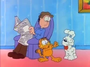 Shaving Cream: Garfield cowers from Odie, who is covered in shaving cream.