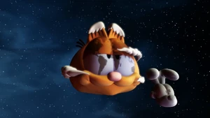 Garfield fantasizes the Earth in his image, and the moon in Odie's.