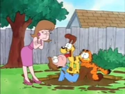 Play in Mud: Jon's date looks down at him after he plays in mud with his pets.