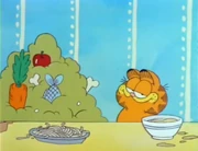 Food Ceiling: Garfield is next to a food-covered Jon