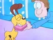 Party: Jon gives his loyal pup party invites to put in the mailbox. Garfield thinks it's a bad idea.