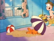 Country Club: Garfield relaxes in his homemade country club before Jon, Odie, and Nermal crash the party.