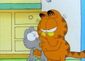 Garfield hugs Nermal