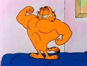 Muscles: Garfield flexes his fat into huge muscles.