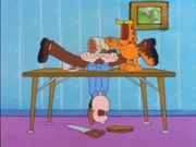 Pierce: Garfield eats Jon's dinner after getting him stuck in the table. Jon yells at him.