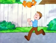 Take a Walk (While Sleeping...): Jon tosses Garfield in his arms while romping through the yard.