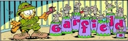 1/15/2006 Garfield the lion tamer in front of mice on podiums that spell his name.
