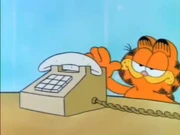 Worth a Quarter: The trap is set. Garfield puts a banana where the phone should be.