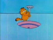 Blame: Garfield loosens the screws of the ceiling lamp so that it will crash upon the slightest impact.