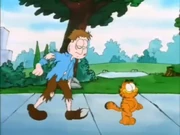 Wig: Jon staggers down the path after Garfield got him in trouble with a large man.