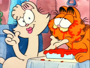 Penelope showing Garfield's typical way of eating.