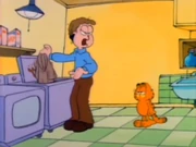 Chocolate Pudding: Jon yells at Garfield for putting pudding into the washer.