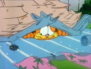 Spider: The spider Garfield tried to squash crawls past him, who slammed a window so hard it brought the house down.