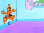 Rat Hole: Garfield gets slammed flat into the wall while chasing Odie.