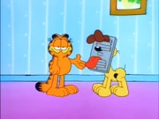 Somnambulism: Garfield gestures to Odie after causing him to run into the heat vent in his sleep.