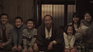 From left to right: Jiro, Saburo, Shiro, Ichiro, Mari, Mami holding Goro, Mako