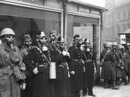 Czechoslovak soldiers using Vz.35 mask, policemen probably using FM-2 masks.