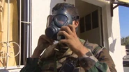 A Syrian soldier demonstrate wearing his MF-11.