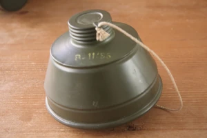 A "Model K" gas mask canister from 8-11-1955