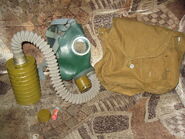 The GP-4u with the Mask, GP-4u Canister (Not an EO-19 Canister), the Canvas Carrier Bag, and an Anti-Fog Pencil.