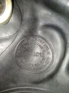 Label on the left ear area