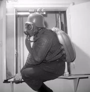Hungarian firefighter in 34M mask with KG120 rebreather aparatus in 1958.