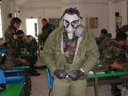 Training2012.jpg (39 KB) Italian Red Cross volunteers donning suits and M9 masks, 2004