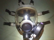 US Navy MCU2/P Medium Gas Mask with Scott 40mm P100 Filter and Clear Polycarbonate Protective Outsert. This MSA mask is dated 2002 and the exhale valve cover is dated 2003