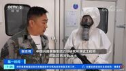 A Chinese soldier seen wearing an MF-14 with a modern coffee can style filter while holding his QBZ 191