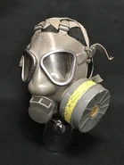 M/61 version 1 gas mask with version 2 exhale valve cover